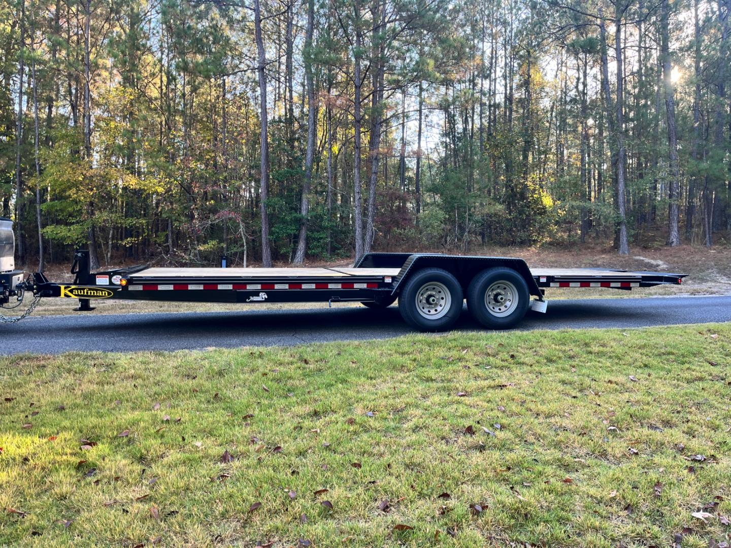 2023 Black Kaufman Trailers 7ft X 22ft Tilt Bed , located at 1330 Rainey Rd., Macon, 31220, (478) 960-1044, 32.845638, -83.778687 - Brand New 2023 Model "Top of the Line" Kaufman Brand 7ft X 22ft Includes the 14ft Tilt Bed at Rear! 8ft Fixed Front Deck! 7 Ton Tilt Bed Flatbed BobCat & Equipment Trailer! Haul Your Truck, Tractor, BobCat, Mini-Excavator, UTV's, ATV's Etc. Tandem 7,000lb Dexter Axles, Electric Brakes on Both Ax - Photo#1