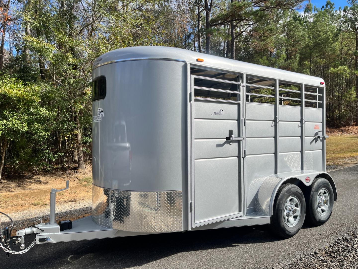 2024 Pewter Metallic Calico 2 Horse Slant , located at 1330 Rainey Rd., Macon, 31220, (478) 960-1044, 32.845638, -83.778687 - Sold, Not In Stock! Please Call for Availability! Brand New 2024 Model 2 Horse Slant Calico Brand Trailer! 6ft Wide X 13ft Long Deluxe Model Tandem Axle Trailer! Easy Close Slant Divider Latch! 16" Radials! Beautiful Silver Metallic Paint is Awesome! Black Pin Striping Looks Fantastic! Fully C - Photo#0