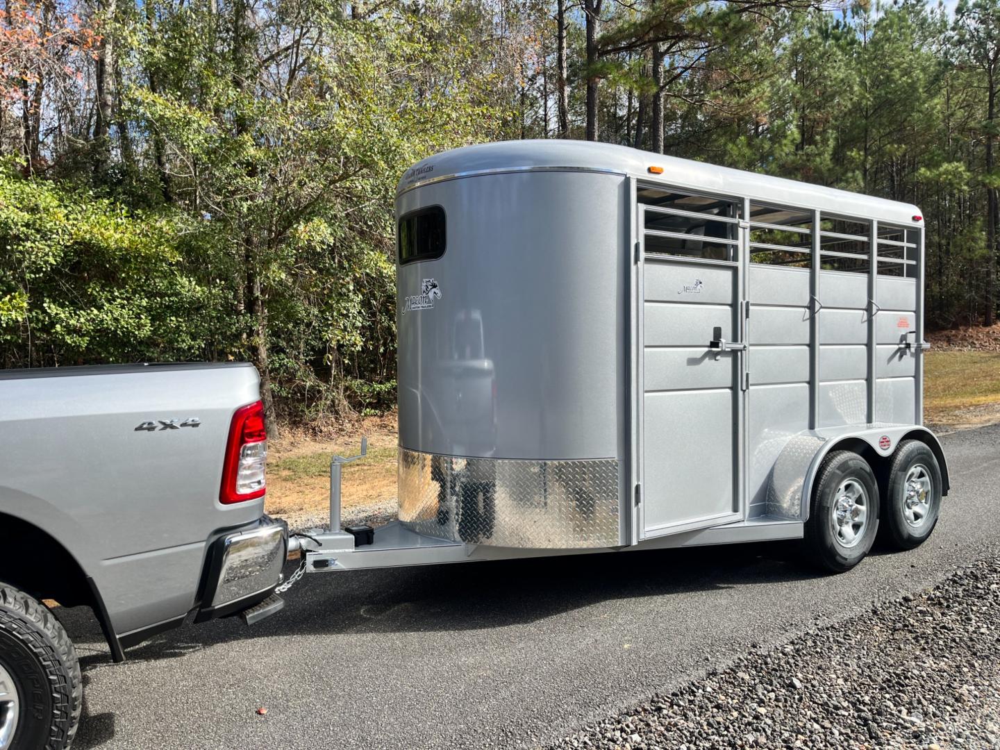 2024 Pewter Metallic Calico 2 Horse Slant , located at 1330 Rainey Rd., Macon, 31220, (478) 960-1044, 32.845638, -83.778687 - Sold, Not In Stock! Please Call for Availability! Brand New 2024 Model 2 Horse Slant Calico Brand Trailer! 6ft Wide X 13ft Long Deluxe Model Tandem Axle Trailer! Easy Close Slant Divider Latch! 16" Radials! Beautiful Silver Metallic Paint is Awesome! Black Pin Striping Looks Fantastic! Fully C - Photo#1