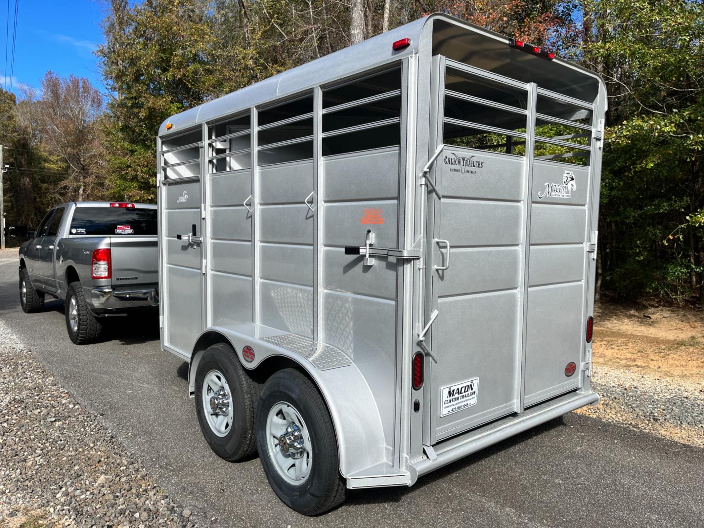 2024 Pewter Metallic Calico 2 Horse Slant , located at 1330 Rainey Rd., Macon, 31220, (478) 960-1044, 32.845638, -83.778687 - Sold, Not In Stock! Please Call for Availability! Brand New 2024 Model 2 Horse Slant Calico Brand Trailer! 6ft Wide X 13ft Long Deluxe Model Tandem Axle Trailer! Easy Close Slant Divider Latch! 16" Radials! Beautiful Silver Metallic Paint is Awesome! Black Pin Striping Looks Fantastic! Fully C - Photo#2