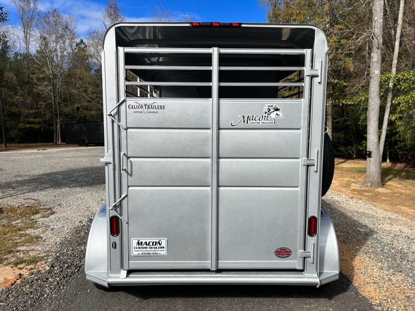 2024 Pewter Metallic Calico 2 Horse Slant , located at 1330 Rainey Rd., Macon, 31220, (478) 960-1044, 32.845638, -83.778687 - Sold, Not In Stock! Please Call for Availability! Brand New 2024 Model 2 Horse Slant Calico Brand Trailer! 6ft Wide X 13ft Long Deluxe Model Tandem Axle Trailer! Easy Close Slant Divider Latch! 16" Radials! Beautiful Silver Metallic Paint is Awesome! Black Pin Striping Looks Fantastic! Fully C - Photo#3