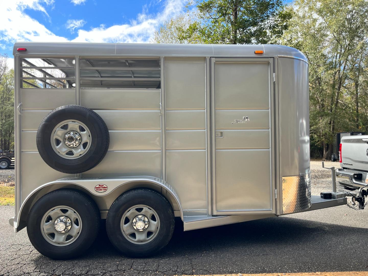 2024 Pewter Metallic Calico 2 Horse Slant , located at 1330 Rainey Rd., Macon, 31220, (478) 960-1044, 32.845638, -83.778687 - Sold, Not In Stock! Please Call for Availability! Brand New 2024 Model 2 Horse Slant Calico Brand Trailer! 6ft Wide X 13ft Long Deluxe Model Tandem Axle Trailer! Easy Close Slant Divider Latch! 16" Radials! Beautiful Silver Metallic Paint is Awesome! Black Pin Striping Looks Fantastic! Fully C - Photo#5