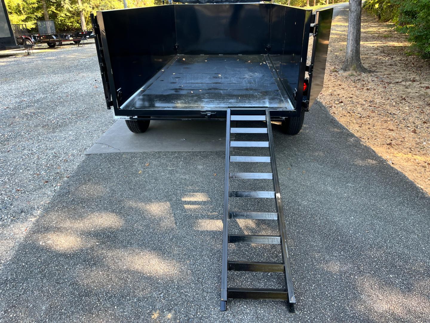 2023 Black Hawke 6ft X 12ft High Sided , located at 1330 Rainey Rd., Macon, 31220, (478) 960-1044, 32.845638, -83.778687 - Brand New 5 Ton 2023 Model Hawke Brand, 6ft X 12ft Dump Trailer! Hawke Dump Trailers are Really Awesome & Heavy Duty! This Fantastic Quality is Seen Everywhere You Look! Extra Height 36" Tall Solid Steel Plate Walls are Heavy Duty! Full Length Heavy Duty Tarp! 5 Ton Total Capacity, or 10,000lbs - Photo#20