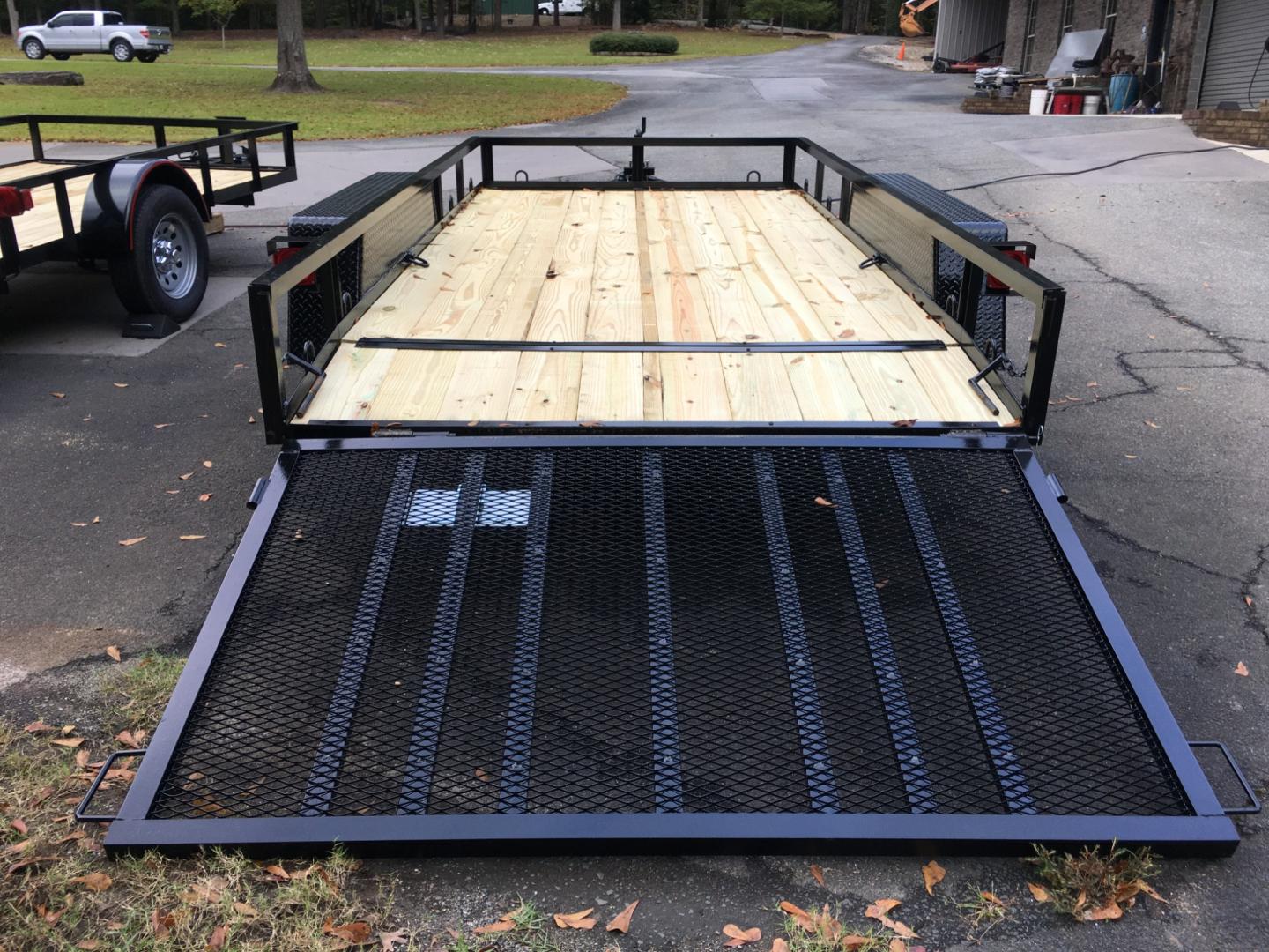 2023 Black Macon Custom Trailers 6.5ft X 14ft Tandem Utility , located at 1330 Rainey Rd., Macon, 31220, (478) 960-1044, 32.845638, -83.778687 - 6ft 6" Wide X 14ft Tandem Long Utility Trailer, is Really Loaded Out! 24" Beavertail Floor at the Rear, Makes it Easy to Load! Haul Lawn Tractor, Lawn Mowers, Landscaping Equipment, Water Tanks, ATV's, Etc. Two 3,500 lb Axle, 7 Pin Connector, Heavy Duty Diamond Plate Fenders! Heavy Duty Construc - Photo#7