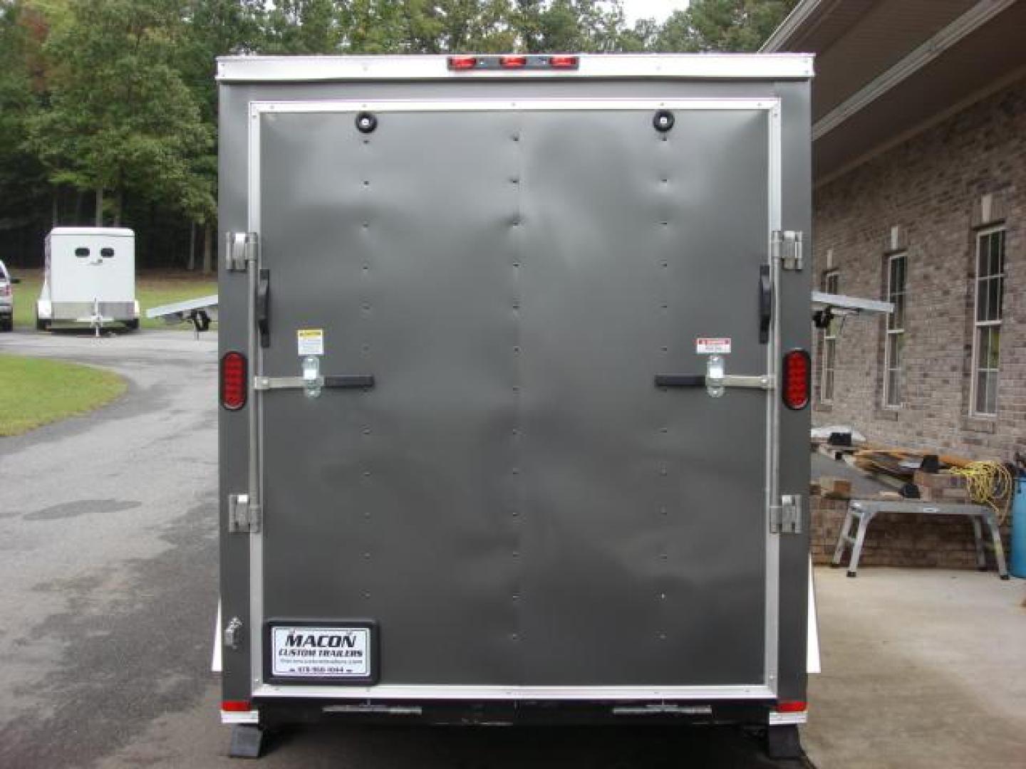 2023 Charcoal Metallic Freedom 6ft X 10ft Hunting Trailer , located at 1330 Rainey Rd., Macon, 31220, (478) 960-1044, 32.845638, -83.778687 - We Sold This Trailer to a Customer in Tennessee, for His Handicapped Son to Hunt Inside! We Could Special Order You One in About 6 Weeks! Call for Current Price! This Price can Vary! Brand New Enclosed Hunting Trailer! Haul Your ATV and Then Hunt From The Same Trailer! Stay Warm & Dry Whil - Photo#10