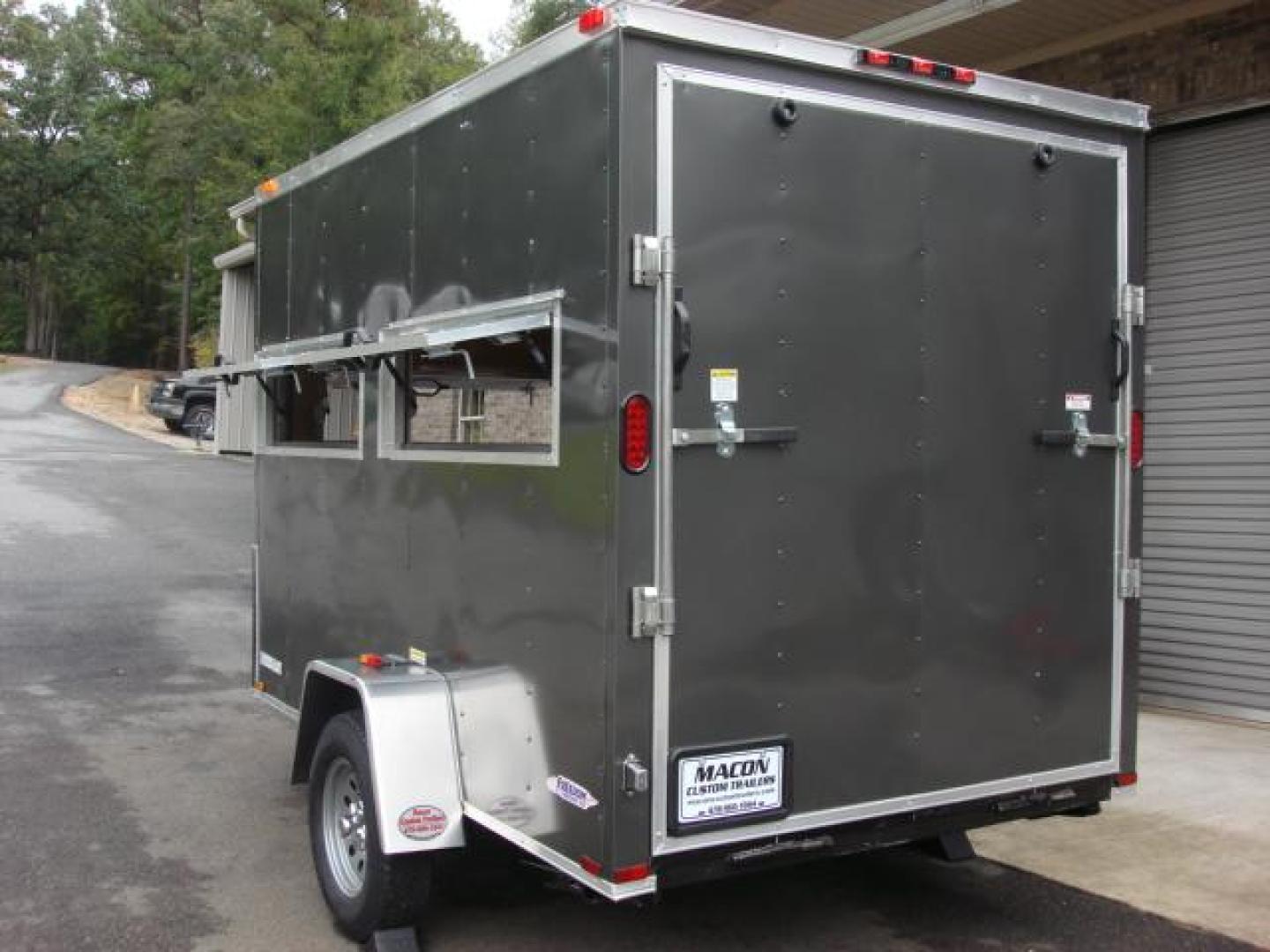 2023 Charcoal Metallic Freedom 6ft X 10ft Hunting Trailer , located at 1330 Rainey Rd., Macon, 31220, (478) 960-1044, 32.845638, -83.778687 - We Sold This Trailer to a Customer in Tennessee, for His Handicapped Son to Hunt Inside! We Could Special Order You One in About 6 Weeks! Call for Current Price! This Price can Vary! Brand New Enclosed Hunting Trailer! Haul Your ATV and Then Hunt From The Same Trailer! Stay Warm & Dry Whil - Photo#11