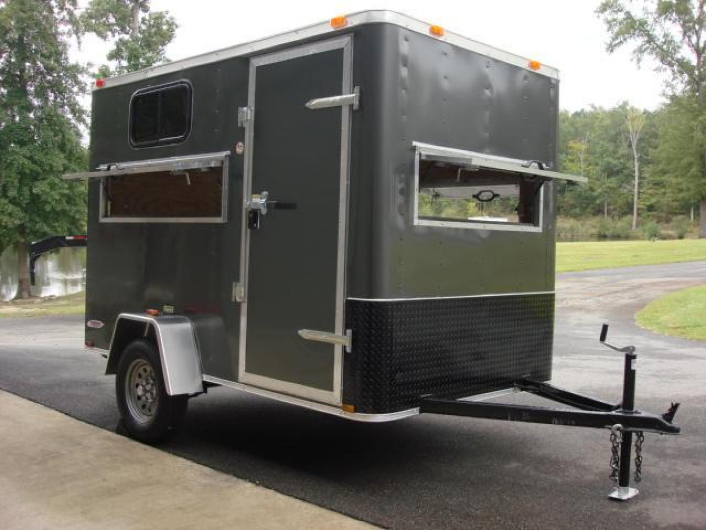 2023 Charcoal Metallic Freedom 6ft X 10ft Hunting Trailer , located at 1330 Rainey Rd., Macon, 31220, (478) 960-1044, 32.845638, -83.778687 - We Sold This Trailer to a Customer in Tennessee, for His Handicapped Son to Hunt Inside! We Could Special Order You One in About 6 Weeks! Call for Current Price! This Price can Vary! Brand New Enclosed Hunting Trailer! Haul Your ATV and Then Hunt From The Same Trailer! Stay Warm & Dry Whil - Photo#1