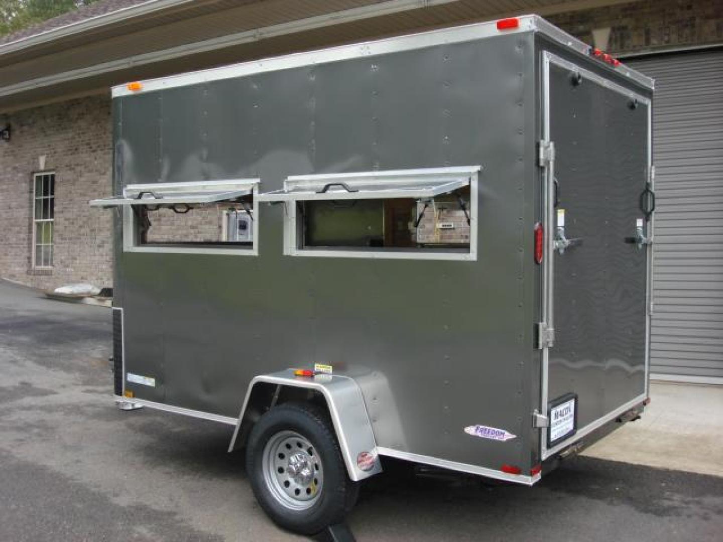 2023 Charcoal Metallic Freedom 6ft X 10ft Hunting Trailer , located at 1330 Rainey Rd., Macon, 31220, (478) 960-1044, 32.845638, -83.778687 - We Sold This Trailer to a Customer in Tennessee, for His Handicapped Son to Hunt Inside! We Could Special Order You One in About 6 Weeks! Call for Current Price! This Price can Vary! Brand New Enclosed Hunting Trailer! Haul Your ATV and Then Hunt From The Same Trailer! Stay Warm & Dry Whil - Photo#4